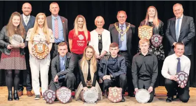  ??  ?? Charlotte Hartley (in red T-shirt) with prize-winning pupils at All Saints’ School