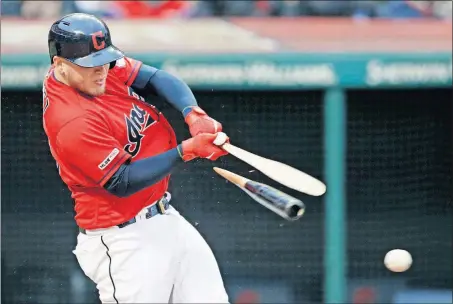  ?? [TONY DEJAK/THE ASSOCIATED PRESS] ?? Roberto Perez’s bat splinters on a batted ball in the fifth inning of the Indians’ game against the Athletics. Perez was out on the play, but later hit his sixth home run of the season.