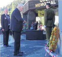  ?? PHOTO: TRACEY ROXBURGH ?? Reflecting . . . World War 2 veteran Raymond Dunn (98), of Kaitaia, pictured after laying his poppy outside the Queenstown Memorial Centre yesterday morning. Behind him is Queenstown RSA president Lyall McGregor.