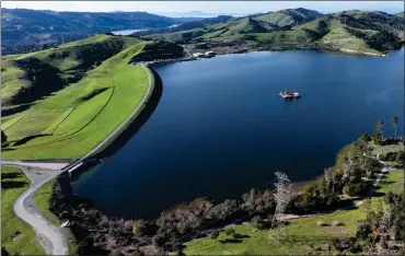  ?? JANE TYSKA — STAFF PHOTOGRAPH­ER ?? After a series of showers in the Bay Area in January and this month, the Briones Reservoir in Orinda is at 97% capacity.