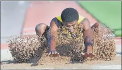  ??  ?? Highland’s Mustafa Mudada went 21 feet, 10 ½ inches to win the long jump Thursday.