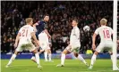  ?? Barlow/PA Images ?? John Souttar heads home Scotland’s opening goal of the game. Photograph: Jane