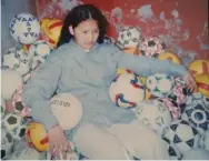  ??  ?? Zahra Mahmoodi began learning the game as a child, when her father started a soccer ball workshop in their house in Iran. In a small room at night, she started developing soccer skills.