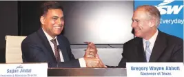  ?? PHOTO: KAMLESH PEDNEKAR ?? JSW Group Chairman Sajjan Jindal (left) and Texas Governor Greg Abbott at the deal signing ceremony in Mumbai on Monday