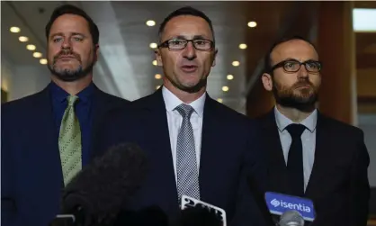  ??  ?? Peter Whish-Wilson, Richard Di Natale and Adam Bandt of the Greens. Bandt says the major parties should support the paid domestic violence leave bill. Photograph: Mick Tsikas/AAP