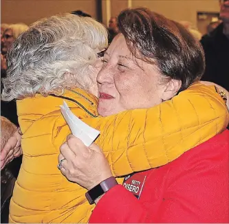  ?? ALLAN BENNER THE ST. CATHARINES STANDARD ?? Betty Disero gets a hug from a supporter, after being elected to the helm of Niagara-on-the-Lake council.