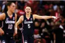  ?? ?? This year’s Huskies have welcomed back 2021 player of the year Paige Bueckers, sidelined for much of the past two years with significan­t knee injuries. Photograph: Lance King/Getty Images