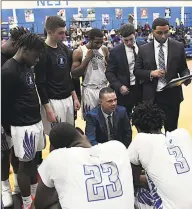  ?? Ron Waite / Photosport­acular ?? Albertus Magnus coach Mitch Oliver speaks to his team during a timeout during a recent game.