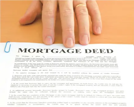  ?? DREAMSTIME ?? A name will remain on a mortgage until the loan gets paid off or if the lender is willing to release the name from the mortgage.