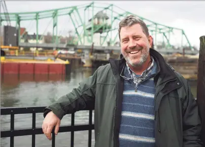  ?? Brian A. Pounds / Hearst Connecticu­t Media ?? Longtime environmen­tal advocate Chris Ozyck, with the Grand Avenue bridge as a backdrop, has been chosen as the 2020 New Haven Register Person of the Year.