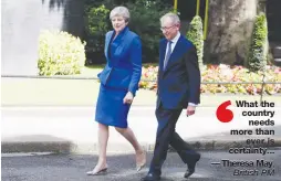  ?? — AP ?? Britain’s Prime Minister Theresa May and her husband Philip arrive at Downing Street in London on Friday after an audience with Queen Elizabeth II.
