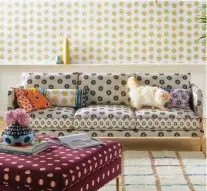  ??  ?? The Linde sofa from Anthropolo­gie, a collaborat­ive collection with luxury lifestyle brand SUNO, features a geometric print and cast-iron legs. The sofa has a chic yet relaxed mid-century modern Italian profile.