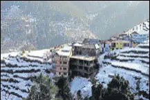  ?? HE FILE ?? A view of the snowcovere­d Dalhousie town in HP.