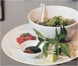  ??  ?? Bao Qi Vietnamese Restaurant serves up pho soups for a song.