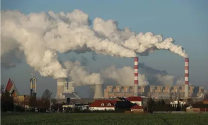  ?? Photograph: Sean Gallup/Getty Images ?? Steam and smoke rise from Bełchatów power station in Poland, one of the countries that has agreed to phase out coal-fired power.