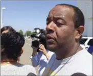  ?? FRANK ELTMAN — AP FILE PHOTO ?? Robert Mickens speaks with reporters outside the U.S. District Courthouse in Central Islip, N.Y. His daughter, Nisa Mickens, was one of two teenagers who were beaten and slashed to death in September 2016in a suspected MS-13gang killing in Brentwood,...