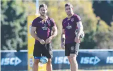  ?? Picture: AAP ?? Ben Hunt (left) and Andrew McCullough at training.