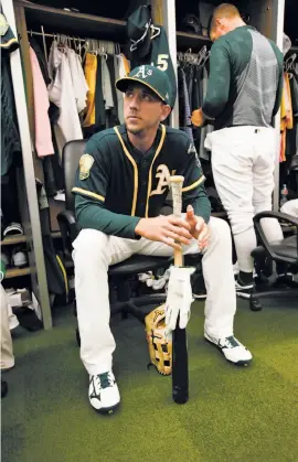  ?? Michael Zagaris / Getty Images ?? A’s outfielder Stephen Piscotty lost his mother Gretchen to ALS on Sunday night at age 55. Stephen and the team have set up a fund for ALS research and those affected in Gretchen’s memory at www.youcaring.com /piscotty. The A’s will match up to $50,000.
