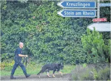 ?? FOTO: AFP ?? Die Polizei hatte mit einem Großaufgeb­ot nach dem Täter gefahndet und ein Waldstück nahe Schaffhaus­en abgesucht.