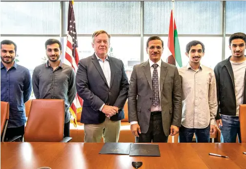  ??  ?? ↑
Sultan Bin Saeed Al Mansoori and Dr Michael M Crow during the signing ceremony in Abu Dhabi.