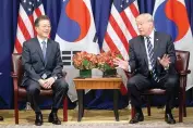  ?? AP Photo/ Evan Vucci ?? President Donald Trump meets with South Korean President Moon Jae-in on Thursday at the Palace Hotel during the United Nations General Assembly in New York.