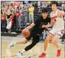  ?? MATT BATES — ENTERPRISE-RECORD
FILE ?? Pleasant Valley’s Aaron Gomez tries to muscle his way past Foothill’s Bekdoo Lewis on Friday Feb. 28 at Butte College.