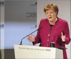  ?? AP PHOTO/KERSTIN JOENSSON ?? German Chancellor Angela Merkel delivers her speech during the Munich Security Conference in Munich, Germany, on Saturday.