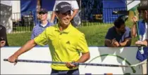  ?? DAVID COOPER, THE CANADIAN PRESS ?? Mike Weir kids around with a hockey stick after he hit from the seventh tee.