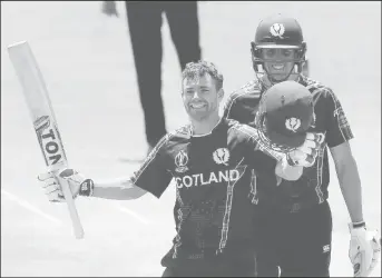  ??  ?? Matthew Cross celebrates his century versus UAE (Courtesy of ICC Media)