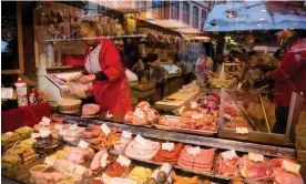  ?? Photograph: AnkNet/Getty Images ?? A meat stall at a Christmas market in Frankfurt. A survey last year found 20% of Germans eat meat every day, down from 34% in 2015.