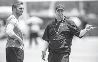  ?? Brett Coomer / Staff photograph­er ?? Texans general manager Brian Gaine, left, and coach Bill O’Brien agree the way to build a successful NFL franchise is to make the best use of the draft.