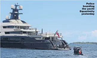  ?? Picture: RULLY PRASETYO/AFP ?? Police boarding the yacht Equanimity yesterday