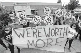  ?? [PAUL SANCYA/ASSOCIATED PRESS] ?? Protesters rally outside a Mcdonald’s in Detroit on Monday during a national workers strike to protest systemic racism and economic inequality.