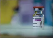  ?? VALENTINA PETROVA — THE ASSOCIATED PRESS FILE ?? A vial of the Oxford-AstraZenec­a vaccine against COVID-19 at a hospital in Sofia, Bulgarian. South Africa on Sunday has suspended plans to inoculate its frontline health care workers with the AstraZenec­a vaccine after a small clinical trial suggested that it isn’t effective in preventing mild to moderate illness from the variant dominant in the country.