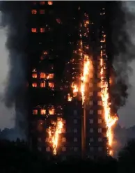  ?? - Reuters ?? BLAZE: Flames and smoke engulf a tower block, in north Kensington, West London, Britain on Wednesday.