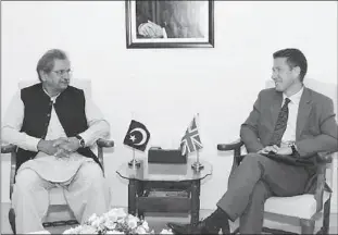  ??  ?? ISLAMABAD
Federal Minister for Education, Profession­al Training, National Heritage and Culture, Shafqat Mahmood talking to British High Commission­er, Christian Turner who calls on him. -APP