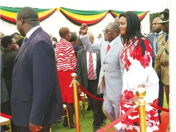  ?? — (Picture by Believe Nyakudjara) ?? President Mugabe and First Lady Amai Grace Mugabe greet China- bound students, who are benefi ciaries of the Presidenti­al Scholarshi­ps Programme at the send- off ceremony at State House in Harare yesterday.