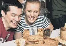  ??  ?? Adrian O’Brien and Nicole Fenwick choose their piece of pie.