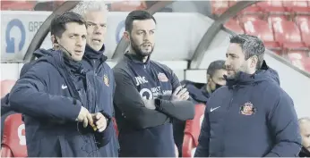  ??  ?? Sunderland head coach Lee Johnson and his backroom staff.