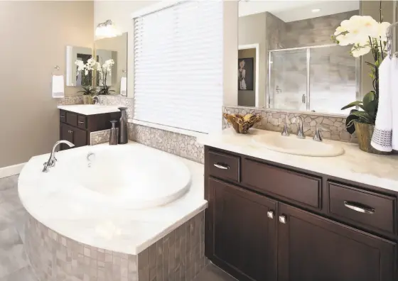  ?? DAVIDON HOMES ?? Luxuriousl­y appointed master suites and baths.