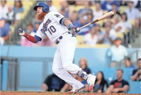  ?? GARY A. VASQUEZ, USA TODAY SPORTS ?? Justin Turner has sparkled at the plate since returning from the disabled list June 9, batting .367 with 10 home runs and 22 RBI.