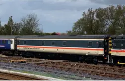  ?? (Steve Goodrum) ?? Looking resplenden­t in InterCity colours, generator coach 96374 stands at Great Yarmouth on May 16, two days after its return from overhaul.