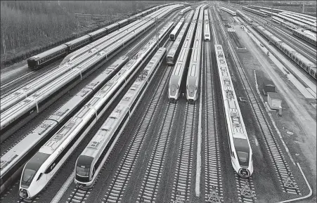  ?? XINHUA ?? Bullet trains are ready for deliveries at CRRC Sifang Co Ltd in Qingdao, Shandong province, on March 26.