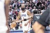  ?? KEVIN JAIRAJ USA TODAY Sports ?? L.A. Clippers guard James Harden (1) will face Kyrie Irving and the Dallas Mavericks in the first round of the NBA playoffs on Sunday in L.A.