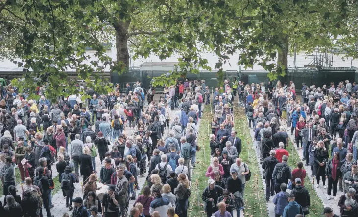  ?? ?? ‘Elizabeth Line’ snakes around Southwark Park, the designated end of the queue; some 250,000 people filed past the Queen's coffin to pay their respects. (Photo by Christophe­r Furlong/Getty Images).