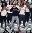  ??  ?? Logic, centre, performed his suicidepre­vention anthem, “1-800-273-8255.”