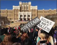  ?? Photo by Brandon Riddle ?? Never again: Students at Little Rock's Central High School participat­e in a walkout Wednesday, March 14, 2018, in solitary with victims of the Parkland, Fla., school shooting last month.
