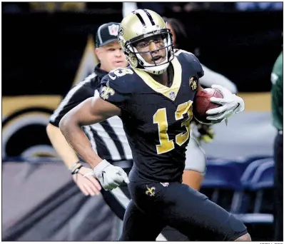  ?? AP/BILL FIEG ?? New Orleans wide receiver Michael Thomas scored on a 72-yard touchdown reception with 3:52 left in the fourth quarter Sunday to help the Saints beat the previously undefeated Los Angeles Rams 45-35 in New Orleans. Thomas had 12 receptions for 211 yards and the score.