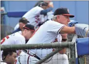  ?? / Blake Silvers ?? Rome Braves manager Rocket Wheeler looks on from the dugout during Game 2 of the South Atlantic League Southern Division Series against the Lexington Legends on Friday at State Mutual Stadium.