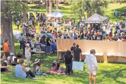  ?? JIM THOMPSON/JOURNAL ?? Hundreds gather at Roosevelt Park on Wednesday for the Road to Change, a nationwide bus tour encouragin­g voter registrati­on and an end to gun violence.